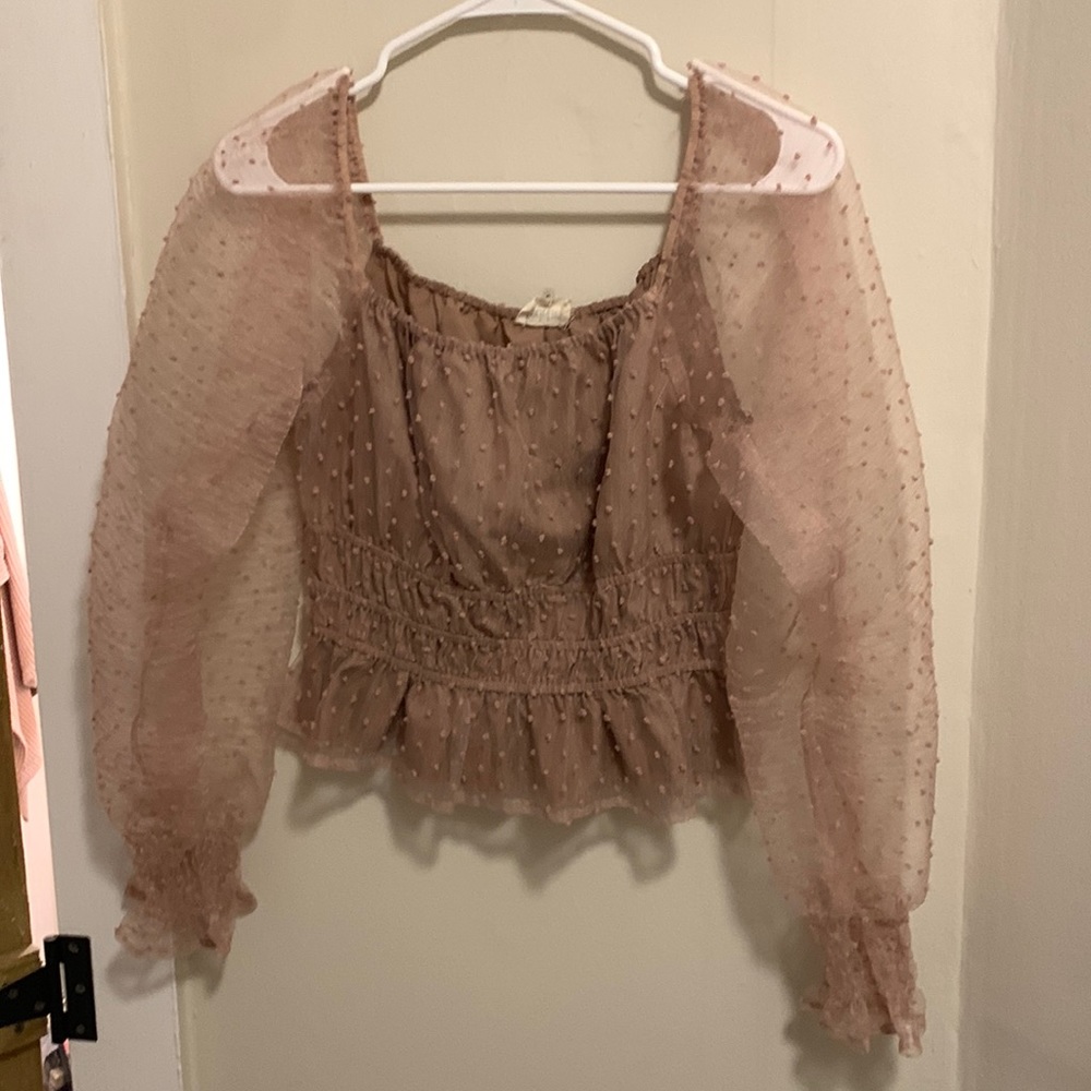 Took off shoulder blouse. Cropped. Good condition. No signs of tearing.